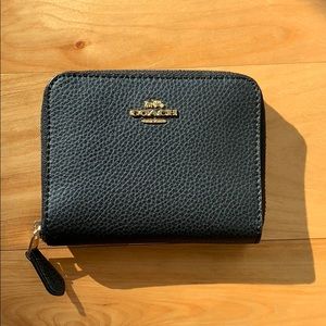 Coach, small zip around wallet.